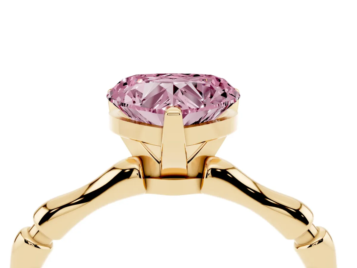 Fancy Pink Heart Cut Solitaire Diamond Ring with Bamboo Band and Four-Prong Setting Yellow gold