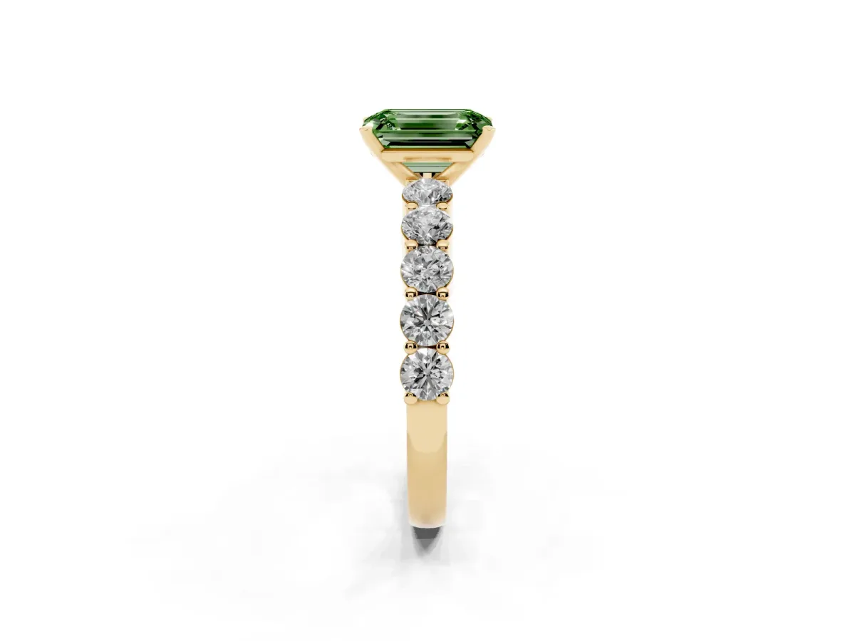 Fancy Green Emerald Cut Diamond Solitaire Ring with Shared Prong Round Side Stones Yellow gold