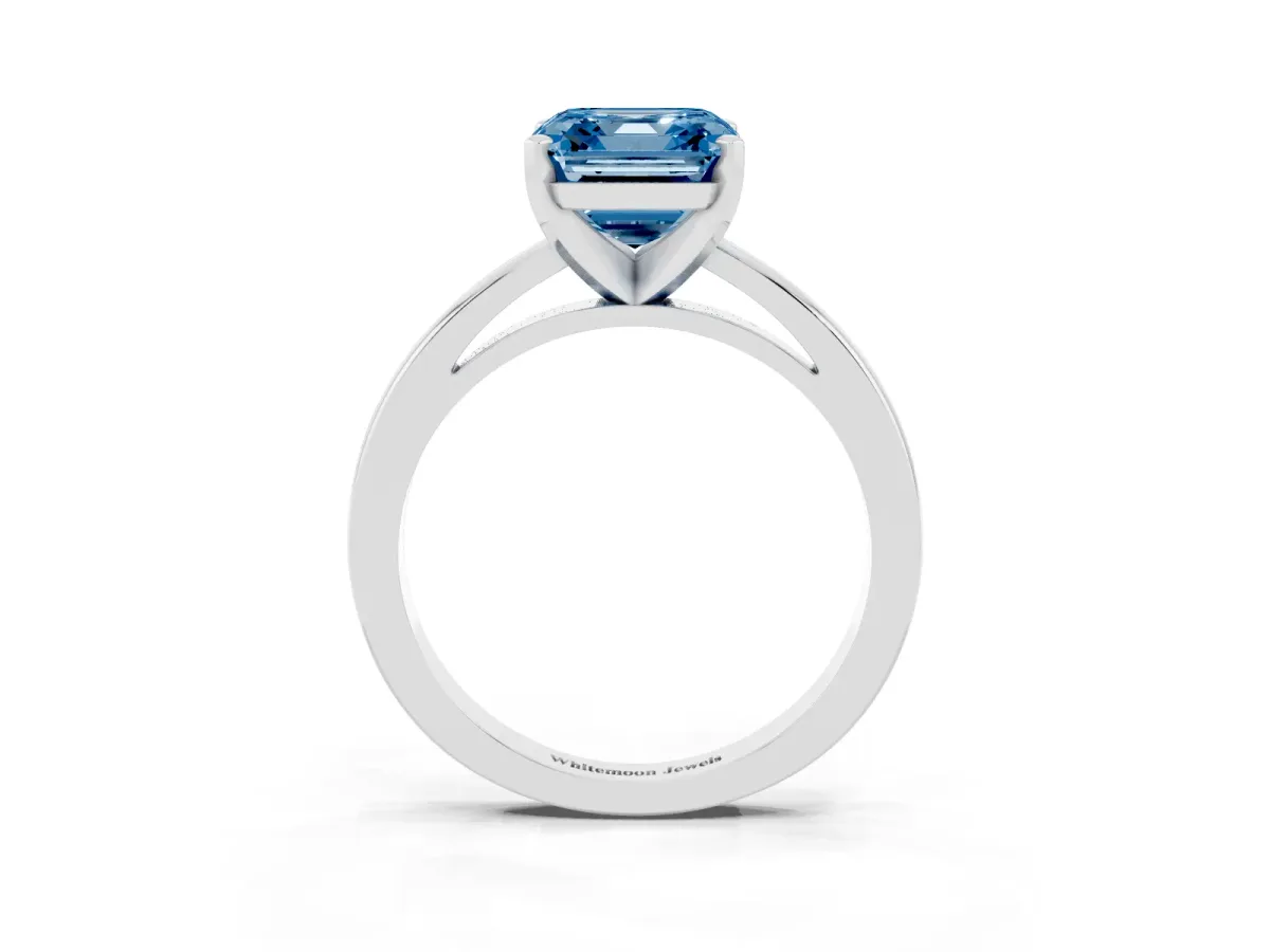 Fancy Blue Asscher Cut Solitaire Diamond Engagement Ring with Four-Prong Setting on a Classic Band Silver