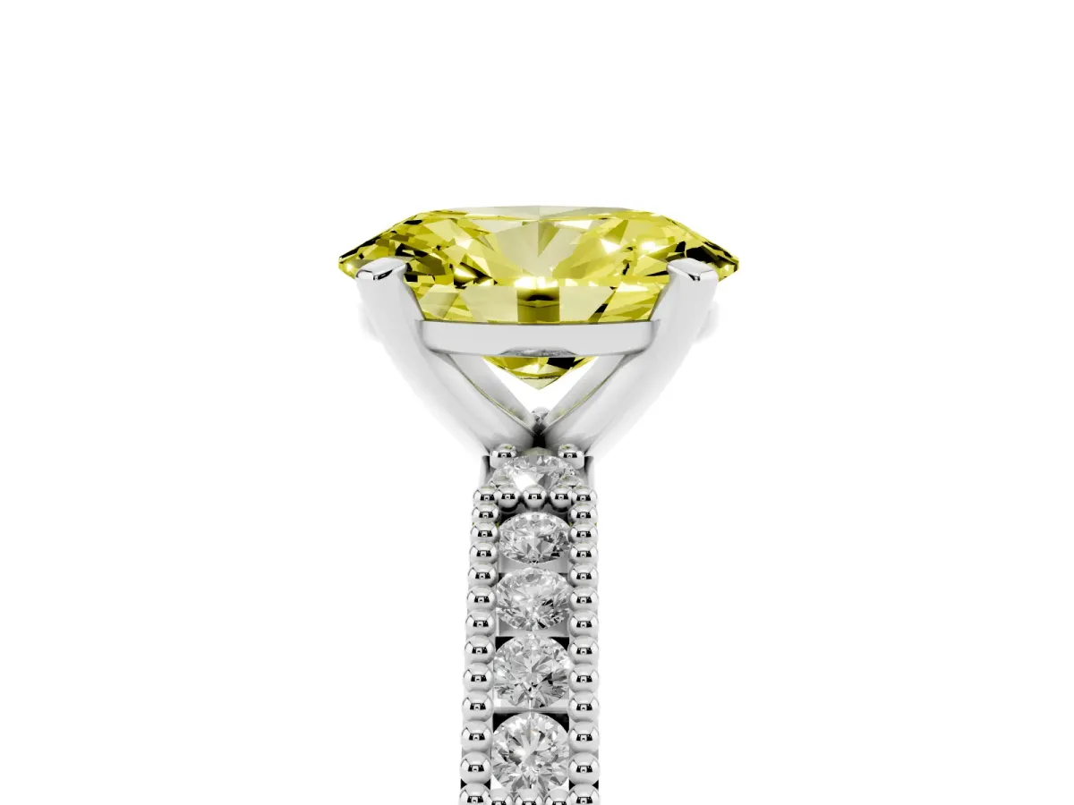 Fancy Yellow Oval Cut Solitaire with Pavé Band and Four-Prong Setting Silver