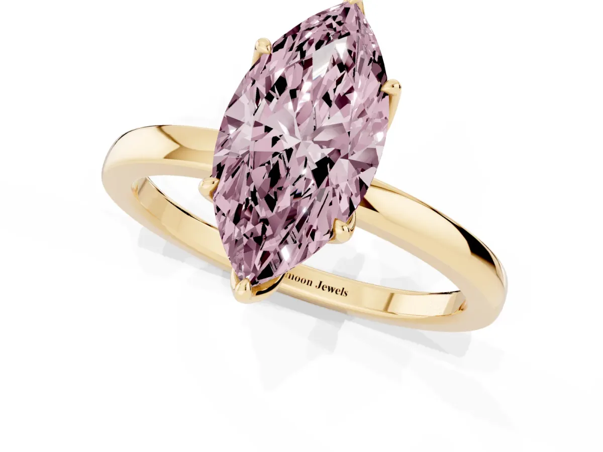 Fancy Pink Marquise Cut Diamond Solitaire Ring with Thin Band and Prong Setting Yellow gold