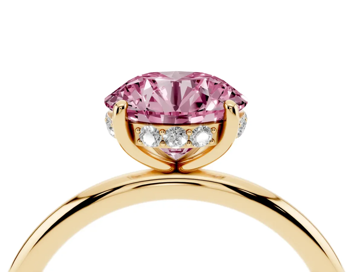 Fancy Pink Round Cut Solitaire Diamond Ring with a Classic Band and Four-Prong Setting Yellow gold