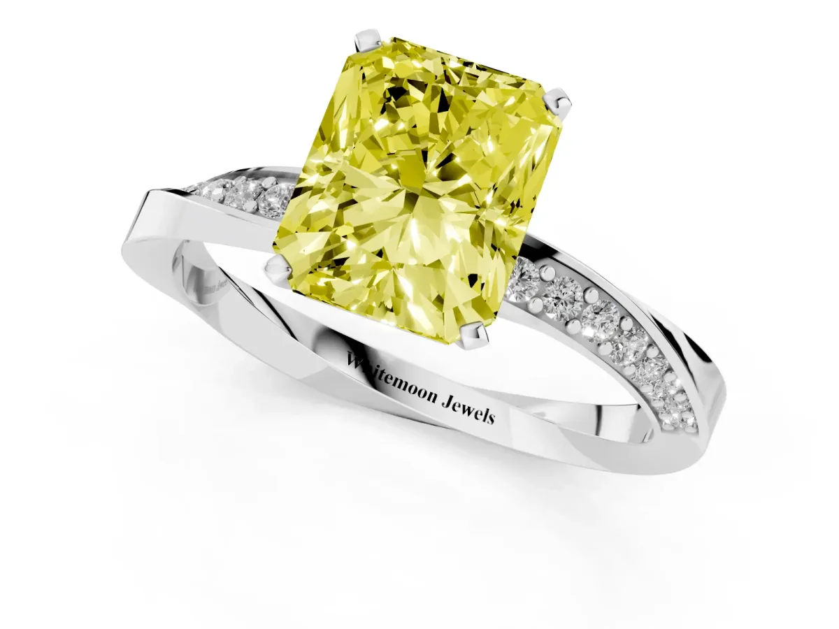 Fancy Yellow Radiant Cut Diamond Engagement Ring with Side Stone Accents and Four-Prong Setting Silver