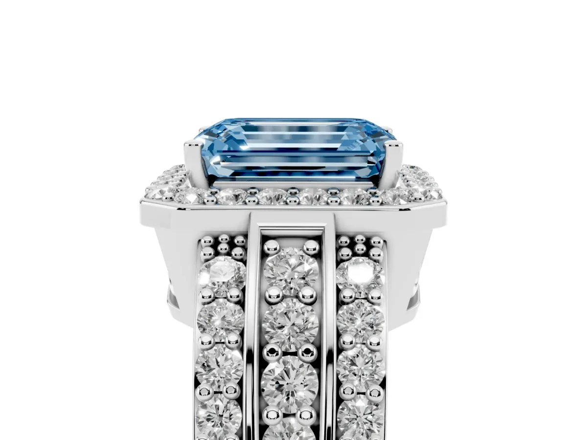 Fancy Blue Emerald Cut Halo Diamond Ring with Round Split Shank and Prong Setting Platinum