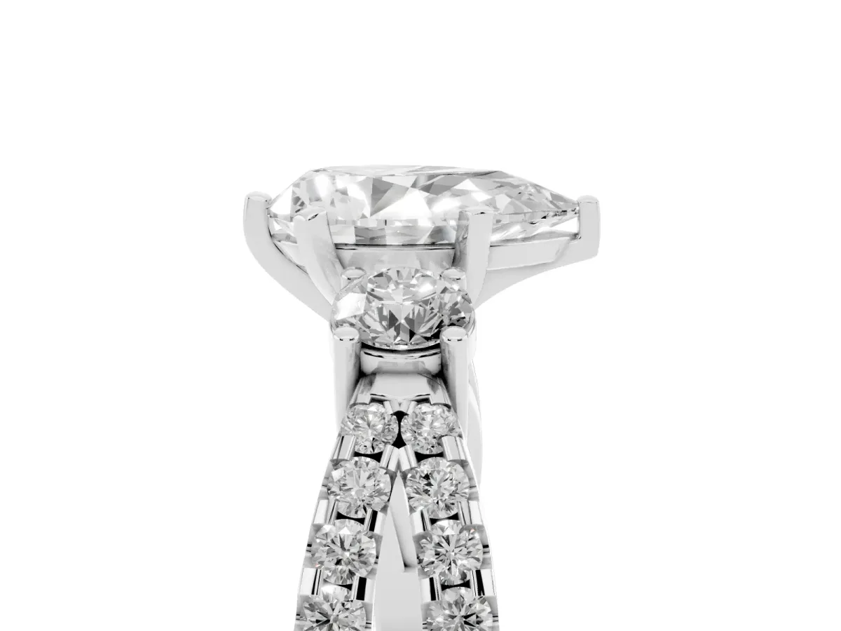 Pear Cut Diamond Three-Stone Ring with Pavé Split Shank and Four-Prong Setting Platinum