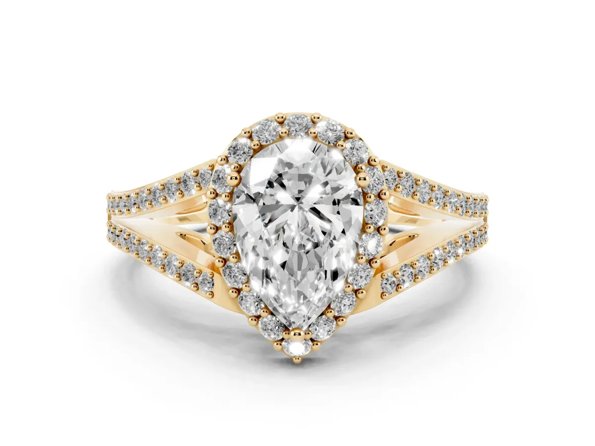 Pear Cut Halo Split Shank Diamond Ring with Prong Setting Yellow gold