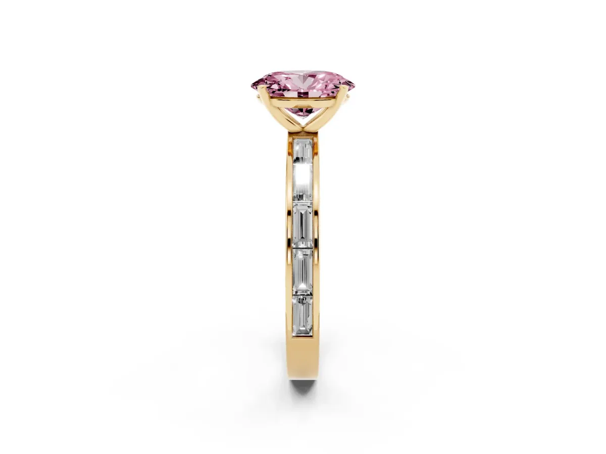 Fancy Pink Oval Cut Solitaire Diamond Ring with Channel-Set Baguette Band and Four-Prong Setting Yellow gold