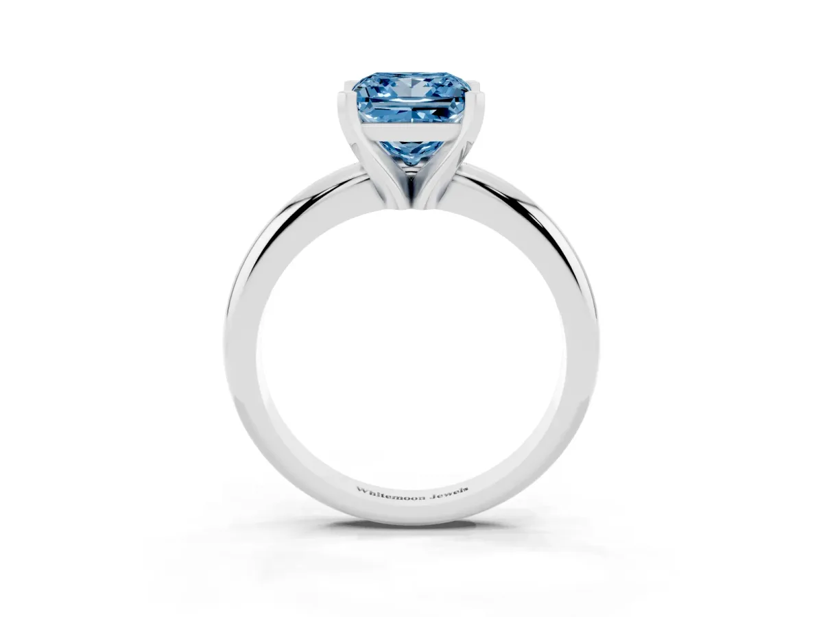 Fancy Blue Princess Cut Diamond Solitaire Engagement Ring with Round Band and Four-Prong Setting Silver