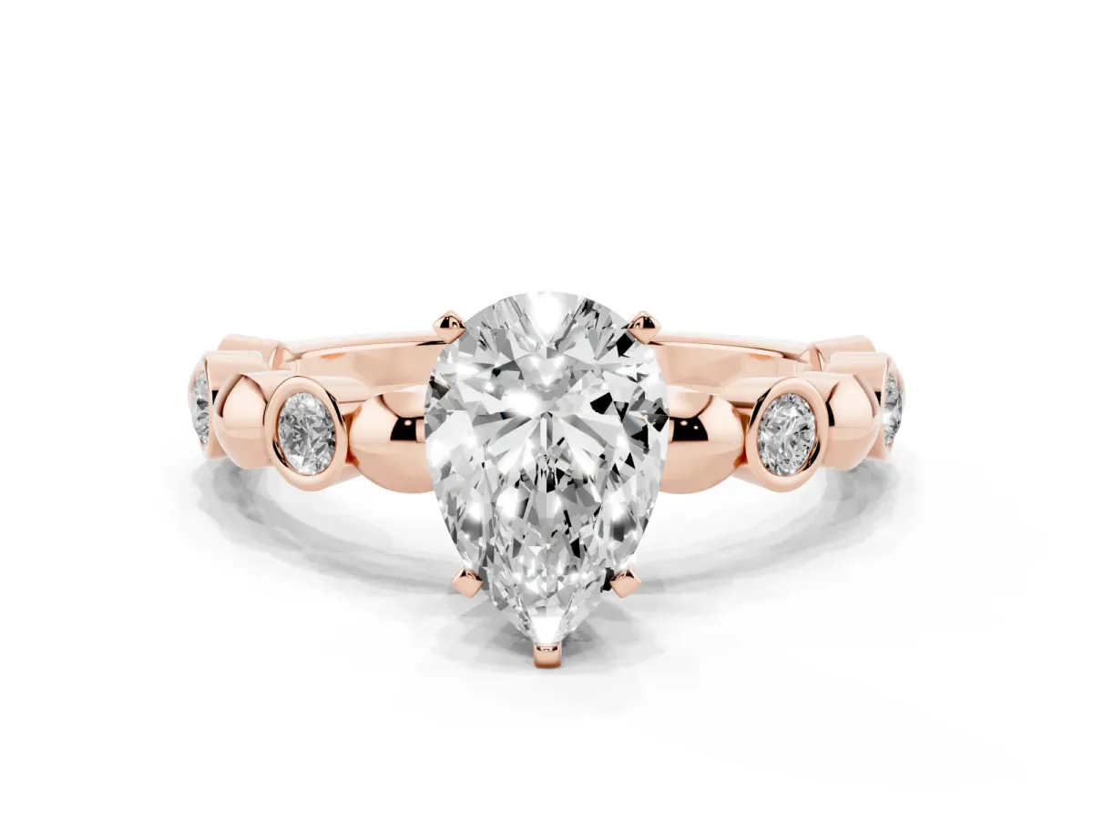 Pear Cut Solitaire Bezel-Set Diamond Ring with Beaded Band and Four-Prong Setting Rose gold