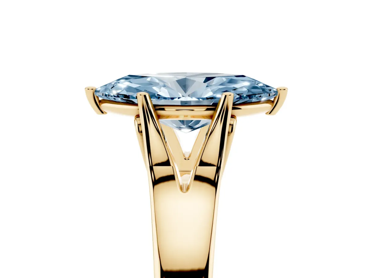 Fancy Blue Marquise Cut Solitaire Diamond Ring with Cathedral Band and Four-Prong Setting Yellow gold