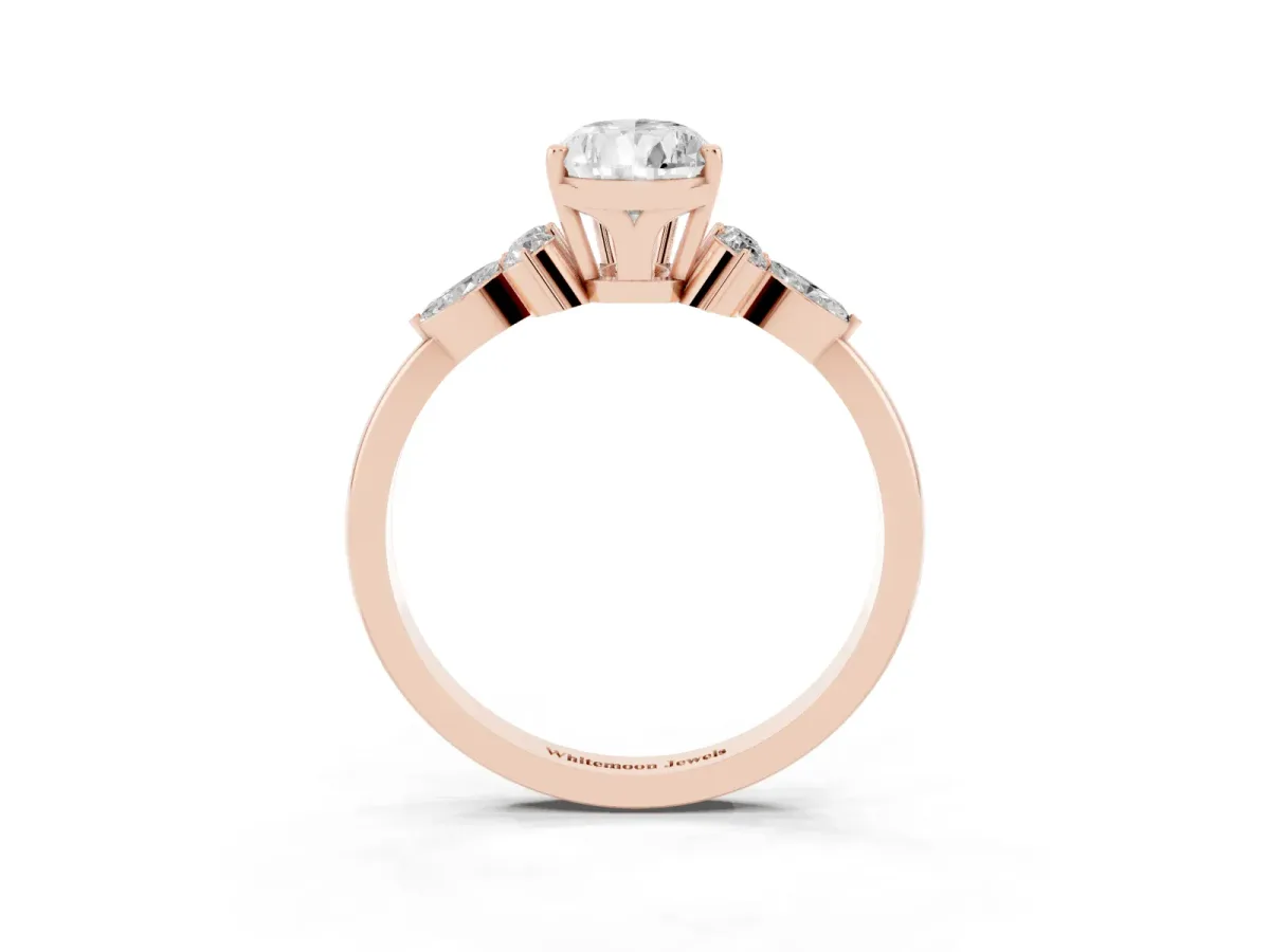 Pear Cut Brilliant Diamond Solitaire Ring with Pear Side Stones and Four-Prong Setting Rose gold