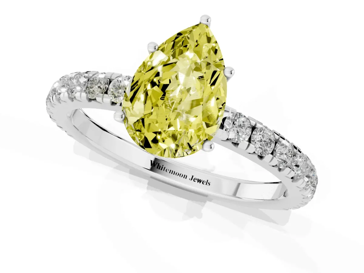 Fancy Yellow Pear Cut Diamond Pavé Solitaire Engagement Ring with Four-Prong Setting Platinum
