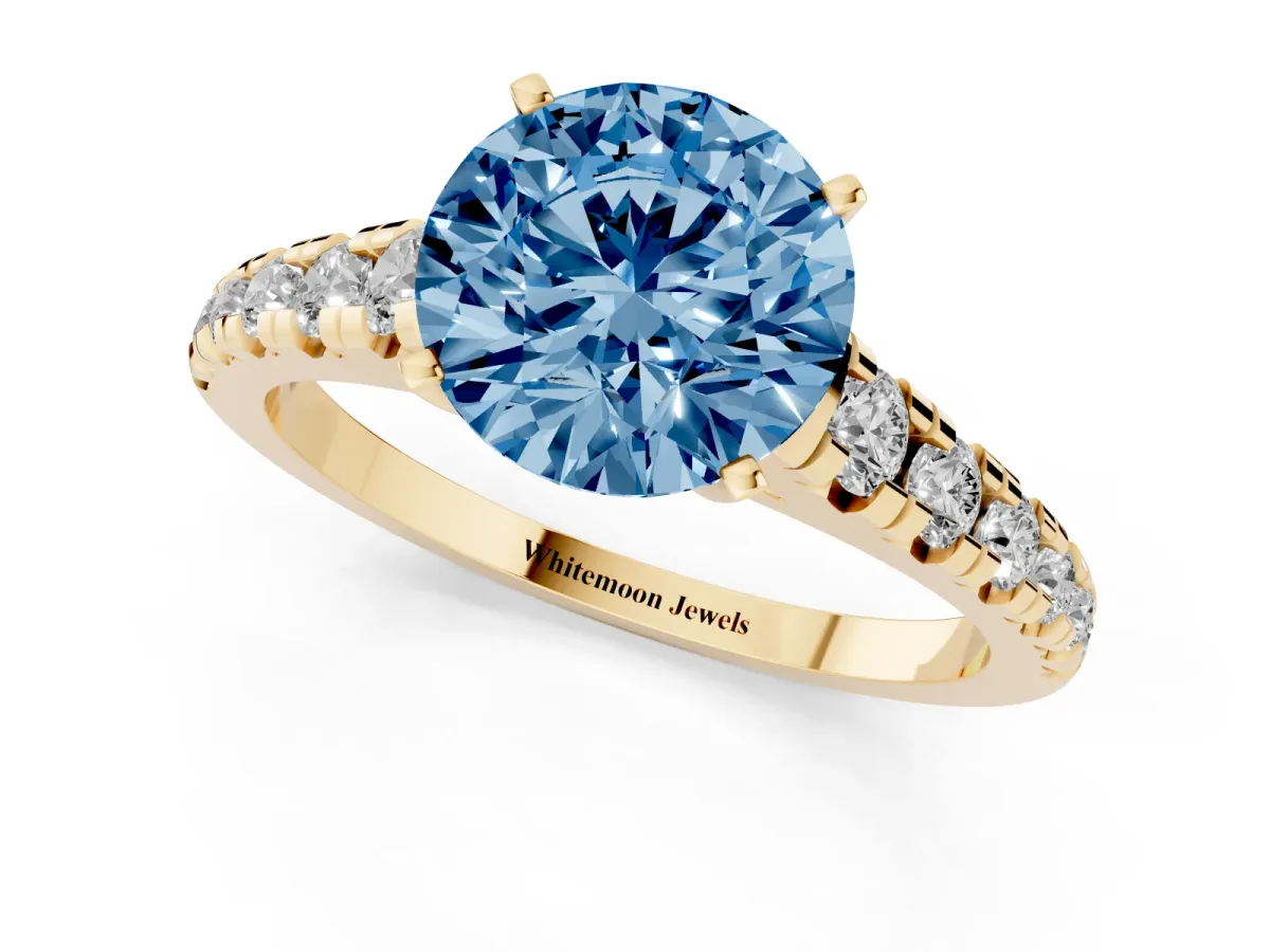 Fancy Blue Round Cut Diamond Cathedral Solitaire Ring with Round Pavé Band Yellow gold