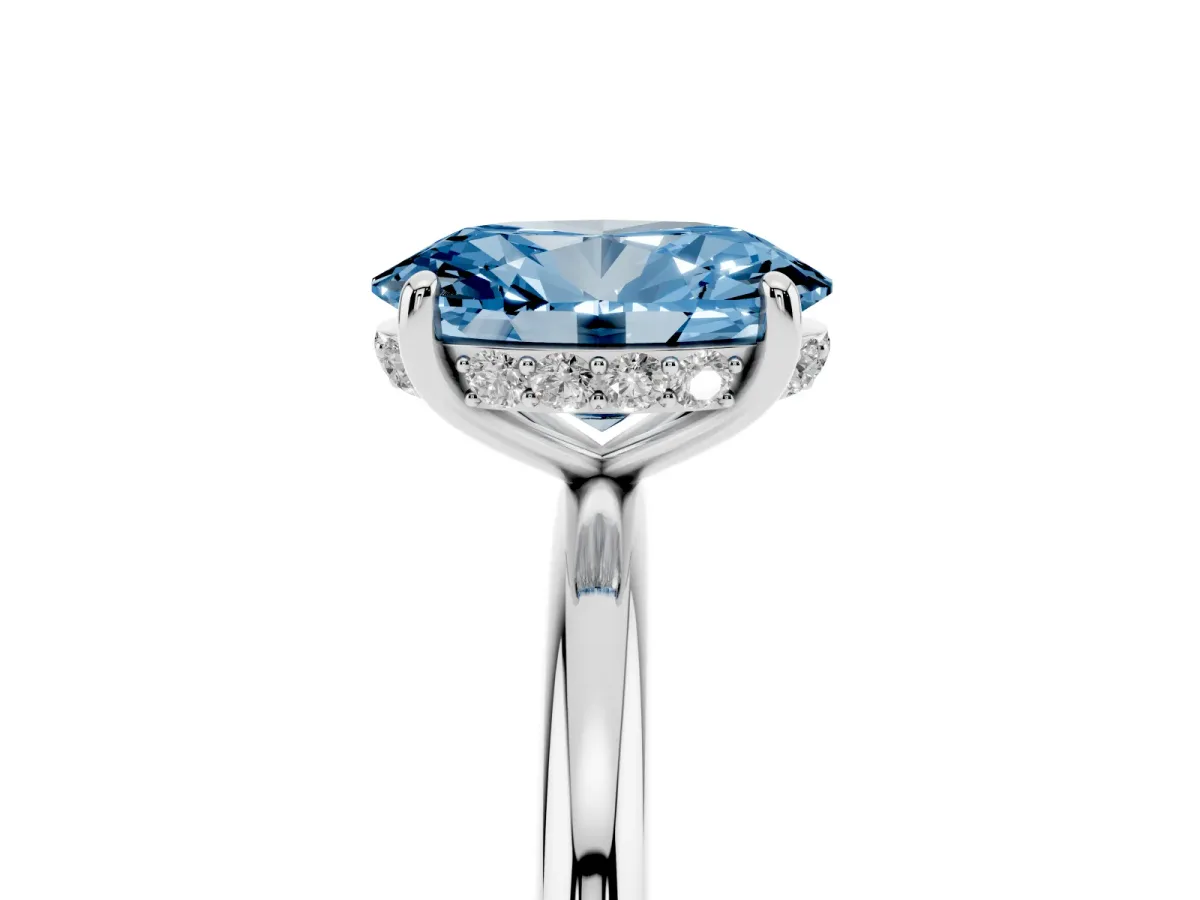 Fancy Blue Oval Cut Solitaire Diamond Ring with a Classic Band and Four-Prong Setting Platinum