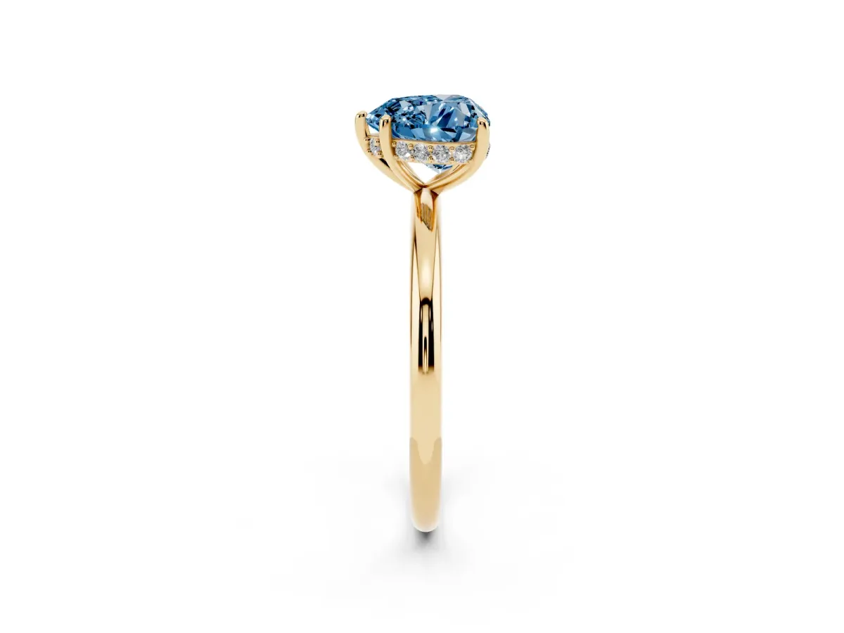 Fancy Blue Heart Cut Solitaire Diamond Ring with a Classic Band and Four-Prong Setting Yellow gold