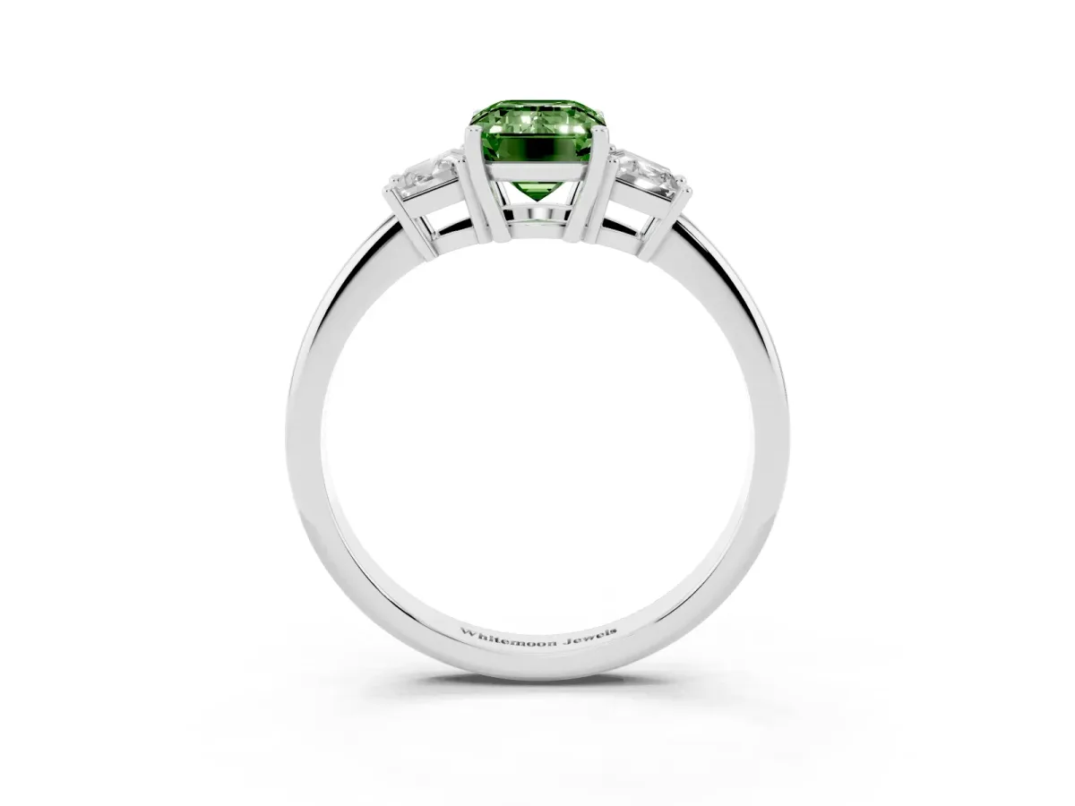 Fancy Green Emerald Cut Diamond Three-Stone Ring with Trapezoid Side Stones and Prong Setting Silver