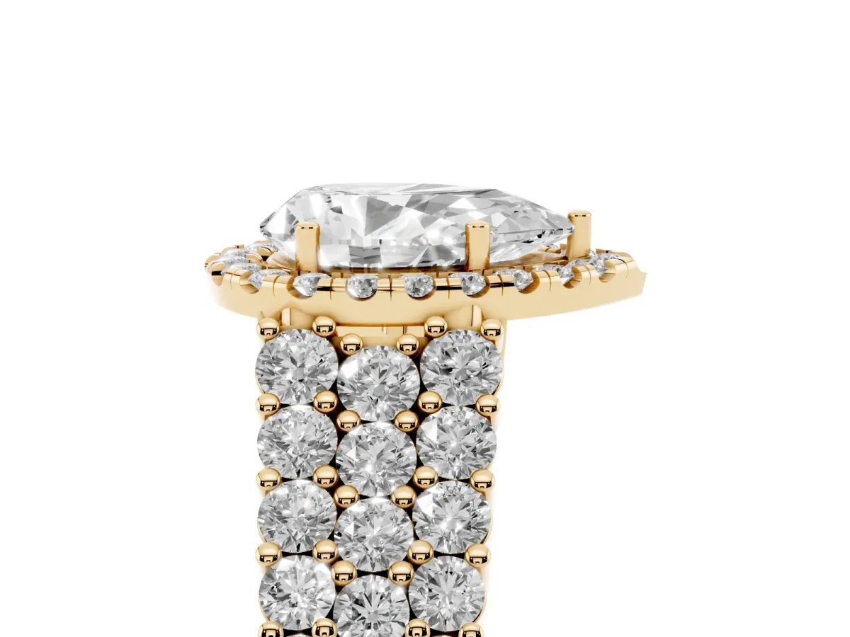 Pear Cut Diamond Halo Engagement Ring with Triple Row Round Pavé Band and Prong Setting Yellow gold