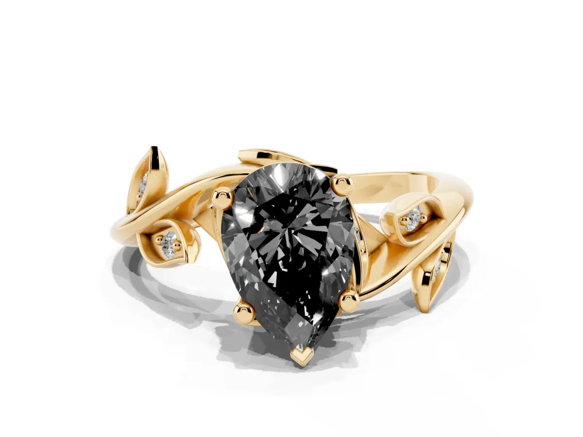 Fancy Black Pear Cut Solitaire Twist Engagement Ring with Leaf Accents and Prong Setting Yellow gold