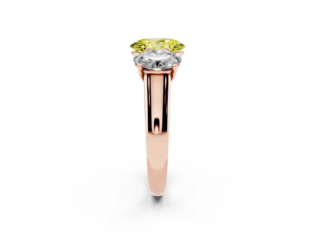 Fancy Yellow Oval Cut Three-Stone Diamond Ring with Prong Setting on a Classic Band Rose gold