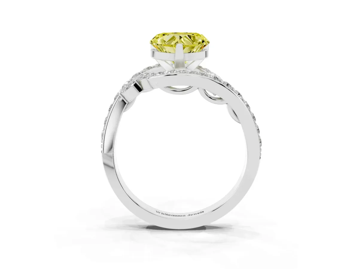 Fancy Yellow Heart Cut Solitaire with Pavé Twist Band and Four-Prong Setting Platinum