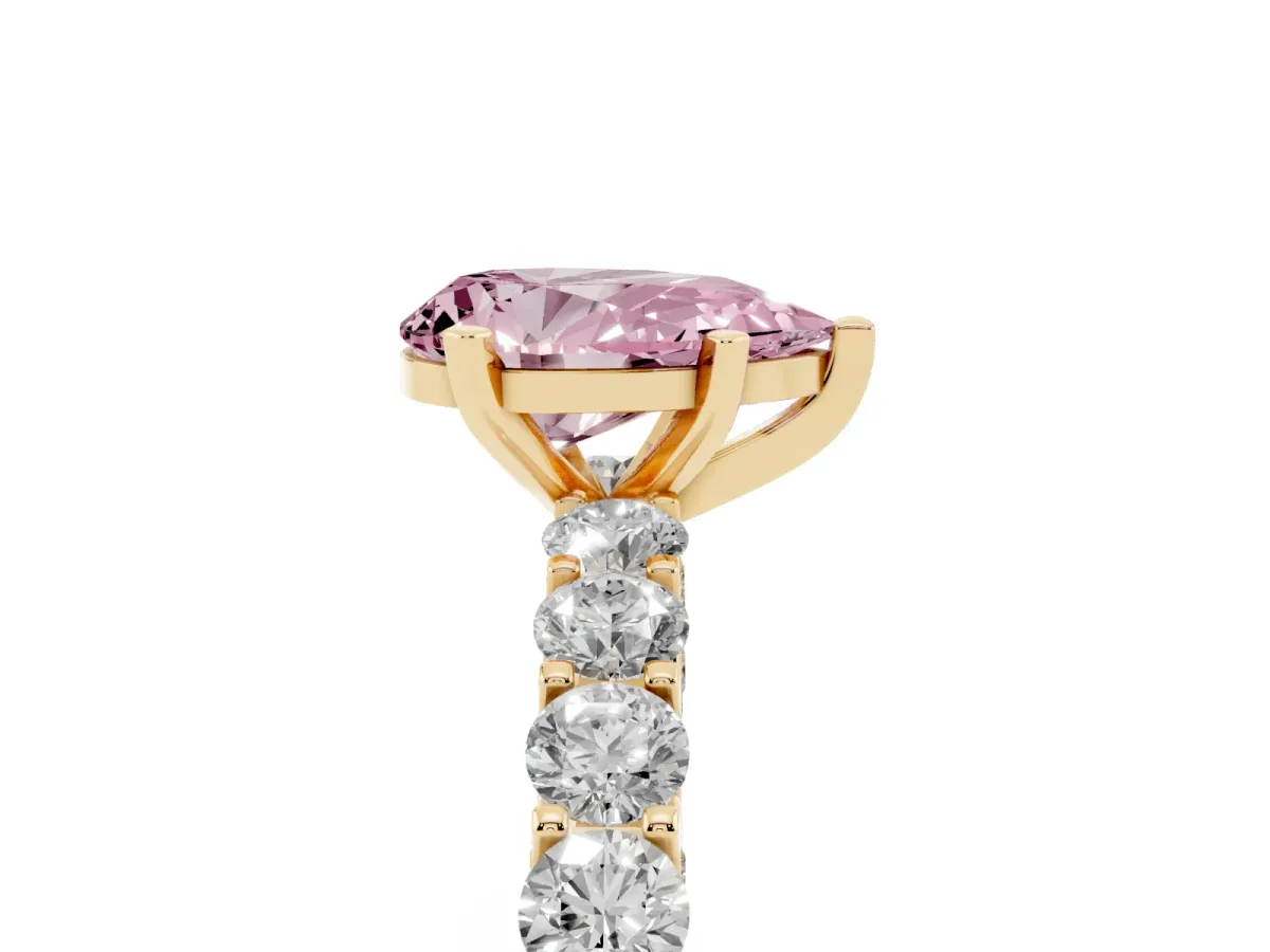 Fancy Pink Pear Cut Diamond Solitaire Ring with Shared Prong Pavé Band and Four-Prong Setting Yellow gold