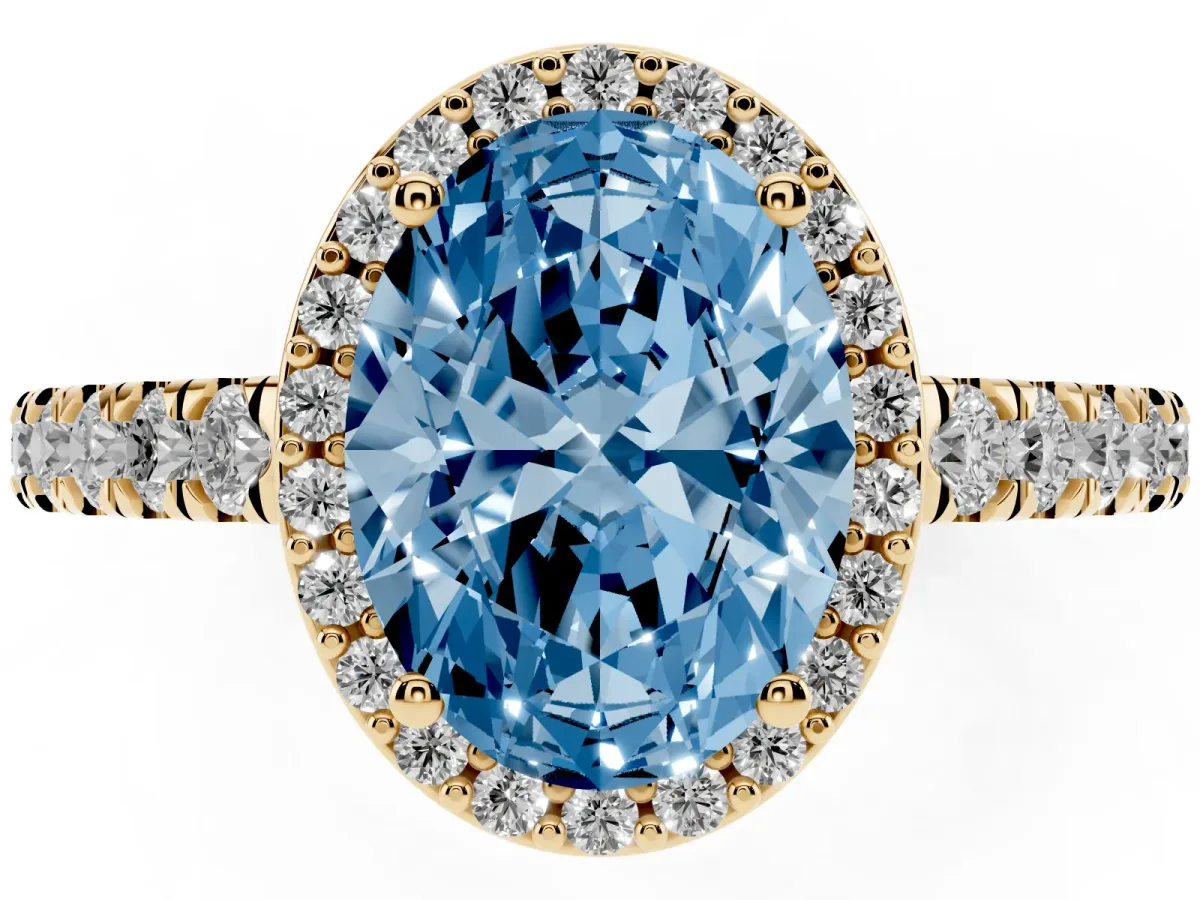 Fancy Blue Oval Cut Cut Halo Diamond Engagement Ring with Pave Band and Four-Prong Setting Yellow gold
