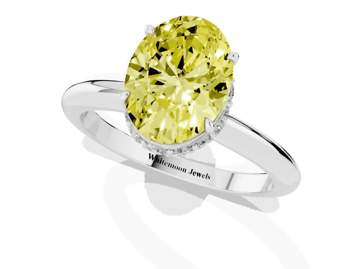 Fancy Yellow Oval Cut Brilliant Solitaire Engagement Ring with Six-Prong Setting and Classic Band Silver