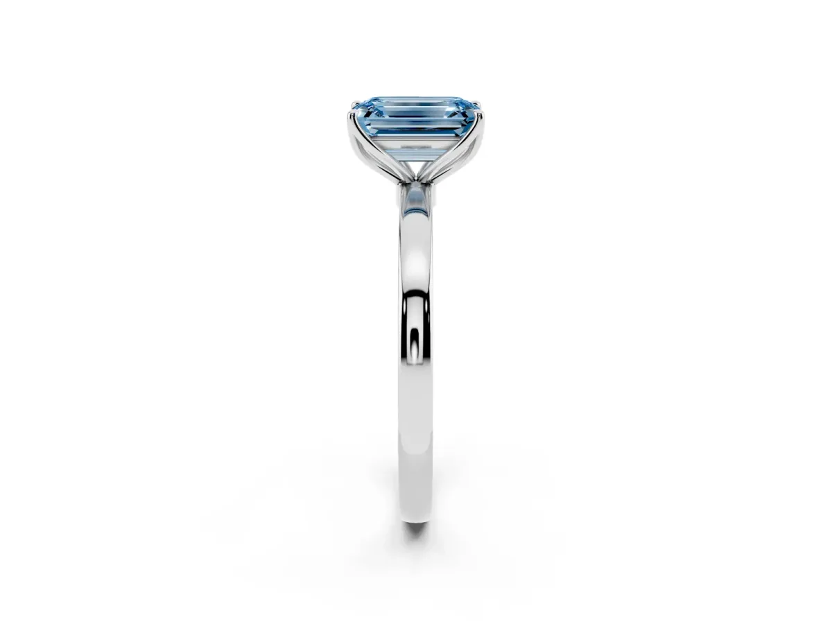 Fancy Blue Emerald Cut Diamond Solitaire Ring with Thin Band and Prong Setting Silver