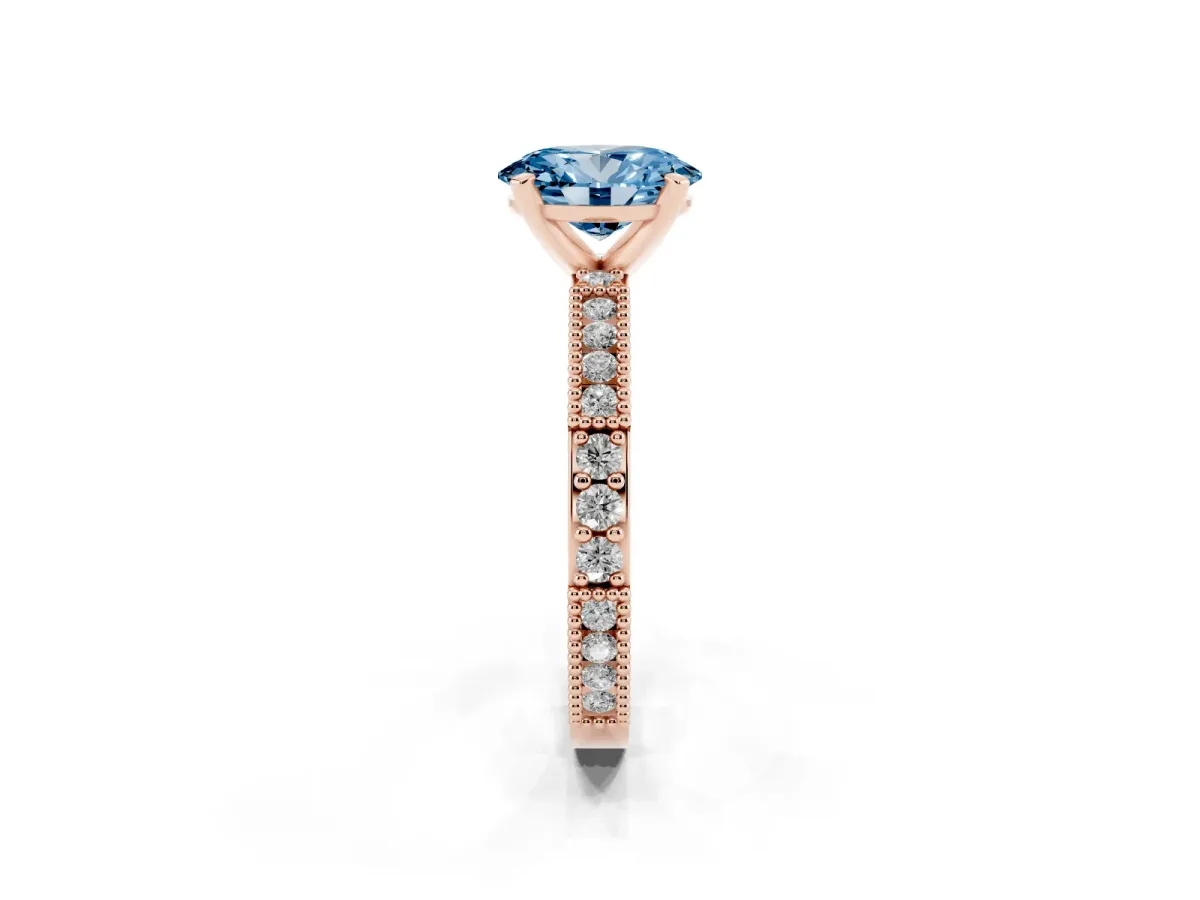 Fancy Blue Oval Cut Solitaire with Pavé Band and Four-Prong Setting Rose gold