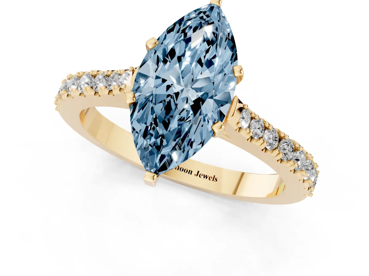 Fancy Blue Marquise Cut Cut Solitaire Diamond Engagement Ring with Pave Band and Four-Prong Setting Yellow gold
