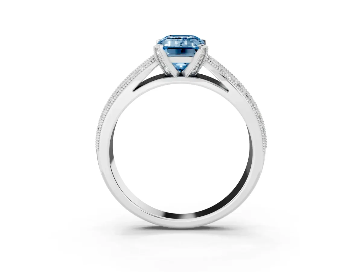 Fancy Blue Emerald Cut Diamond Solitaire Ring with Milgrain Round Pavé Band and Prong Setting Silver