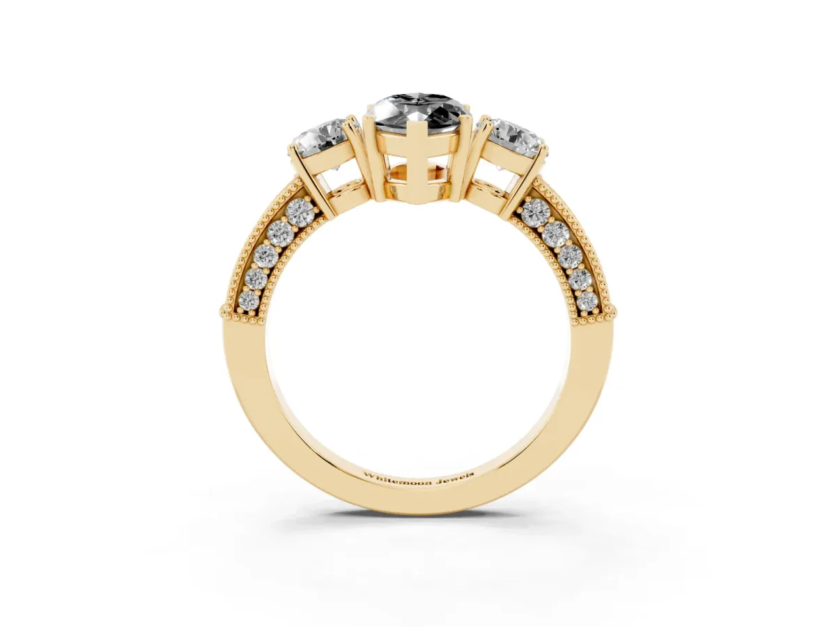 Fancy Black Marquise Cut Three-Stone Diamond Ring with Pavé Band and Four-Prong Setting Yellow gold