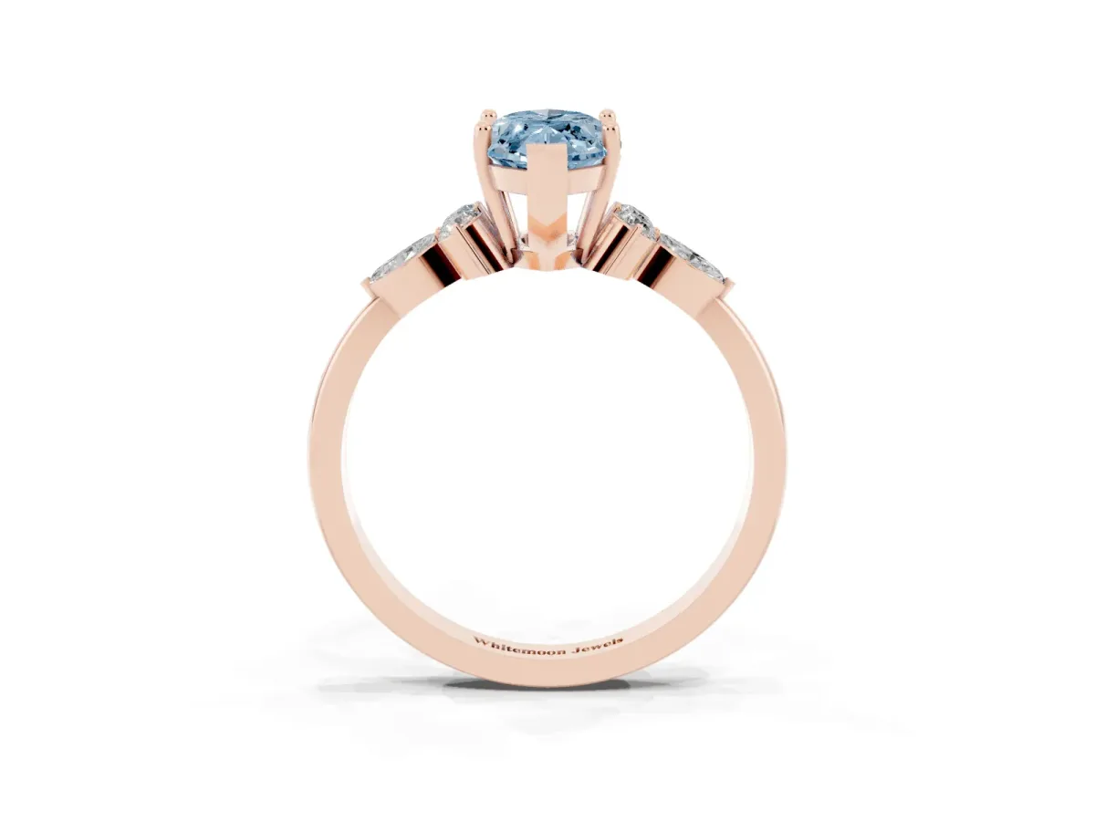 Fancy Blue Marquise Cut Brilliant Diamond Solitaire Ring with Pear Side Stones and Four-Prong Setting Rose gold