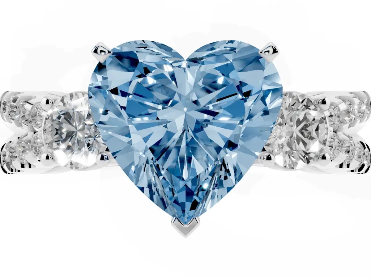 Fancy Blue Heart Cut Diamond Three-Stone Ring with Pavé Split Shank and Four-Prong Setting Silver