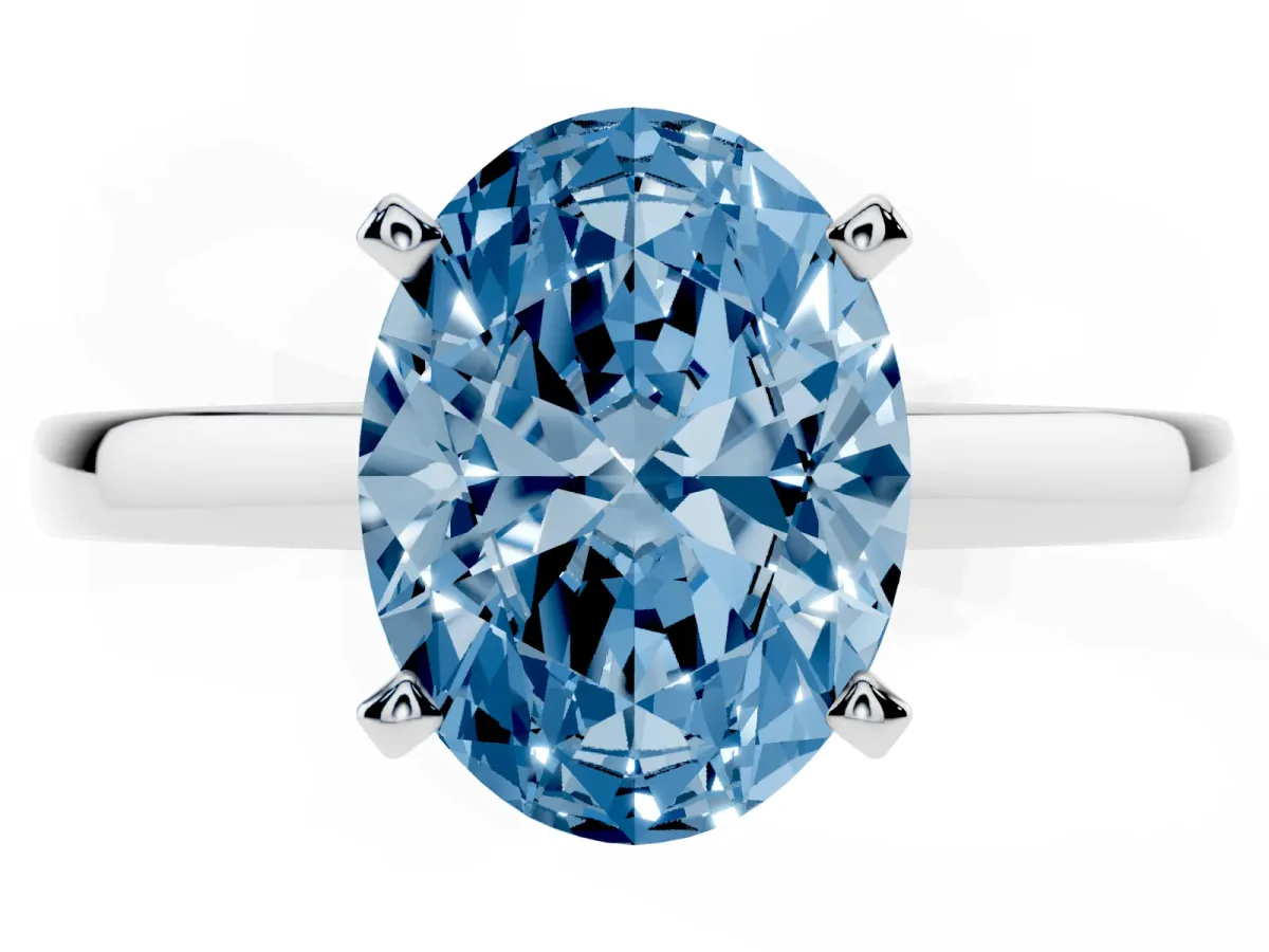 Fancy Blue Oval Cut Solitaire Diamond Engagement Ring with Four-Prong Setting on a Classic Band Silver