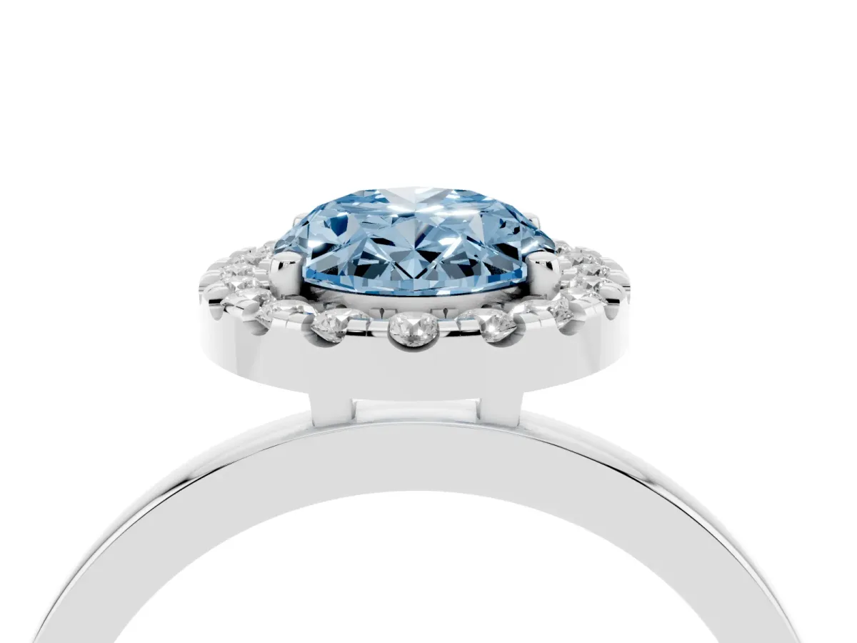 Fancy Blue Oval Cut Halo Diamond Solitaire with Pavé Band and Four-Prong Setting White gold
