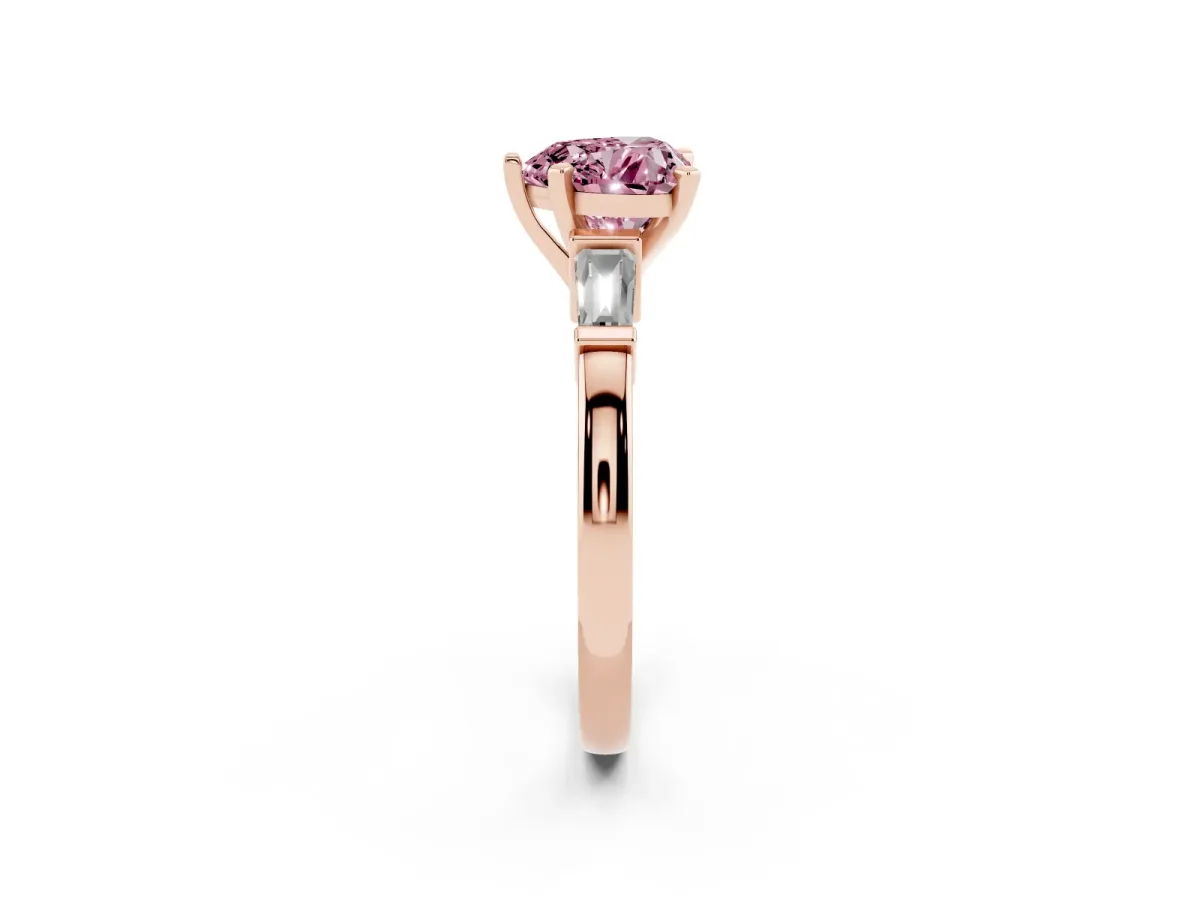 Fancy Pink Heart Cut Cut Diamond Solitaire Ring with Tapered Baguette Accents and Four-Prong Setting Rose gold
