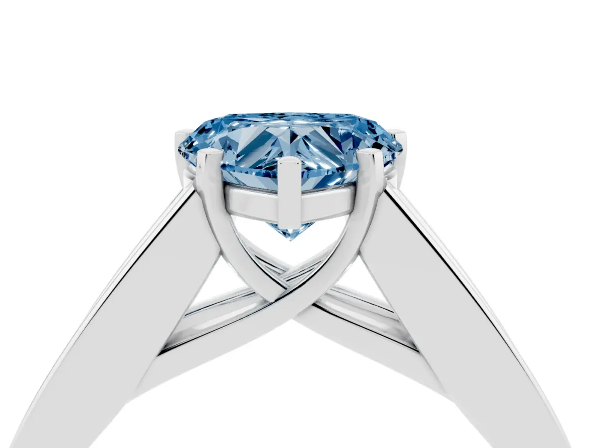 Fancy Blue Heart Cut Cut Channel Set Solitaire Ring with Four-Prong Setting Silver
