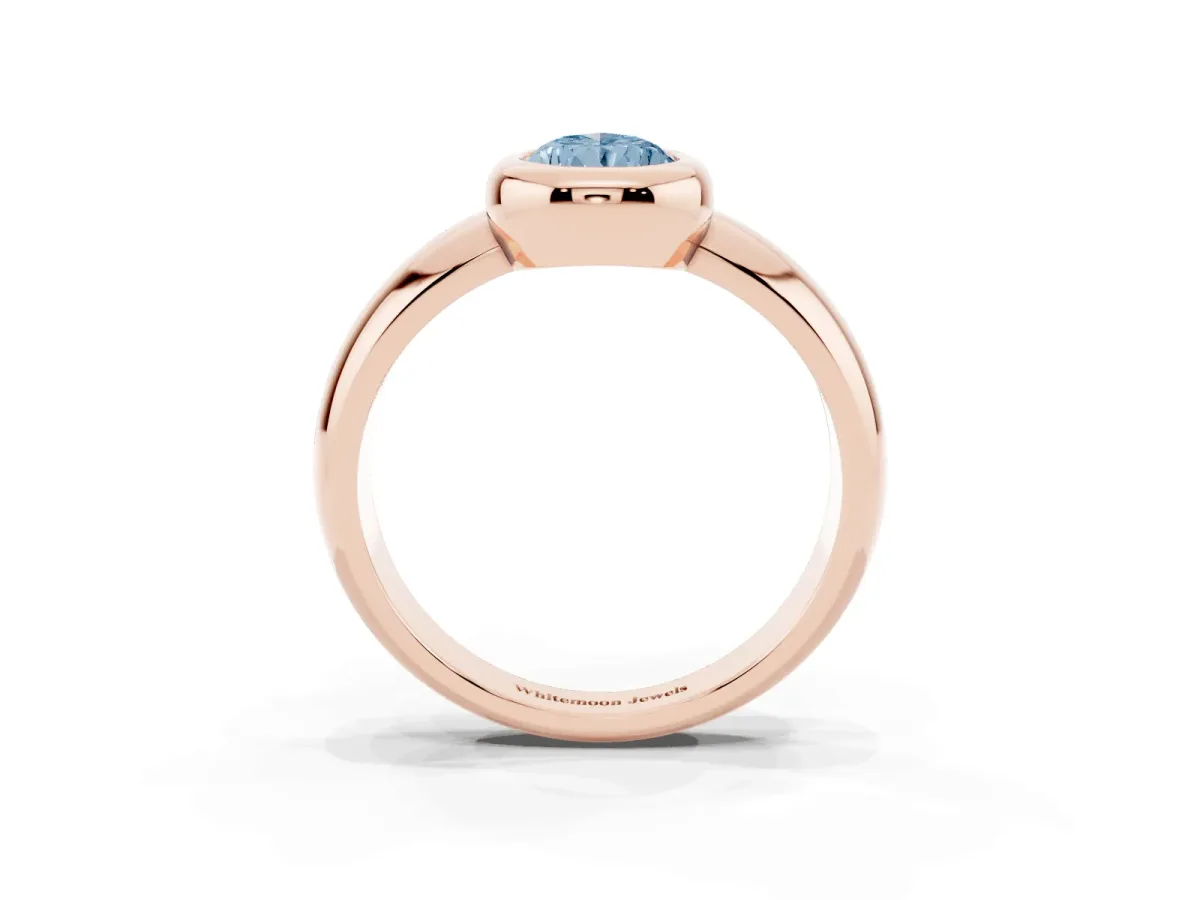 Fancy Blue Bezel Set Pear Cut Solitaire Ring with Wide Band Rose gold