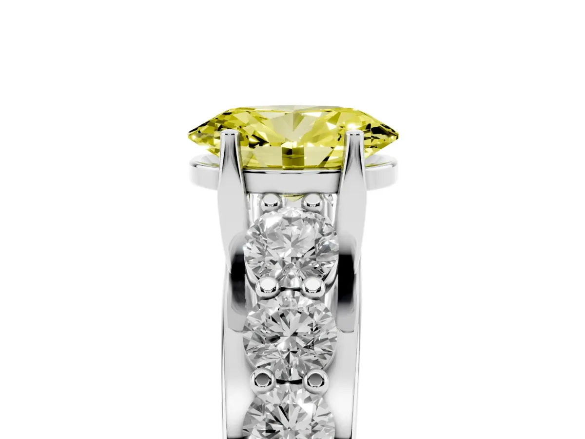 Fancy Yellow Oval Cut Diamond Engagement Ring with Pavé Band and Four-Prong Setting Silver