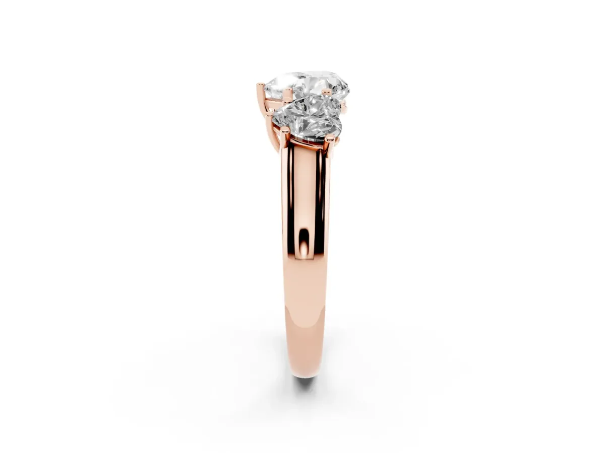 Heart Cut Three-Stone Diamond Ring with Prong Setting on a Classic Band Rose gold