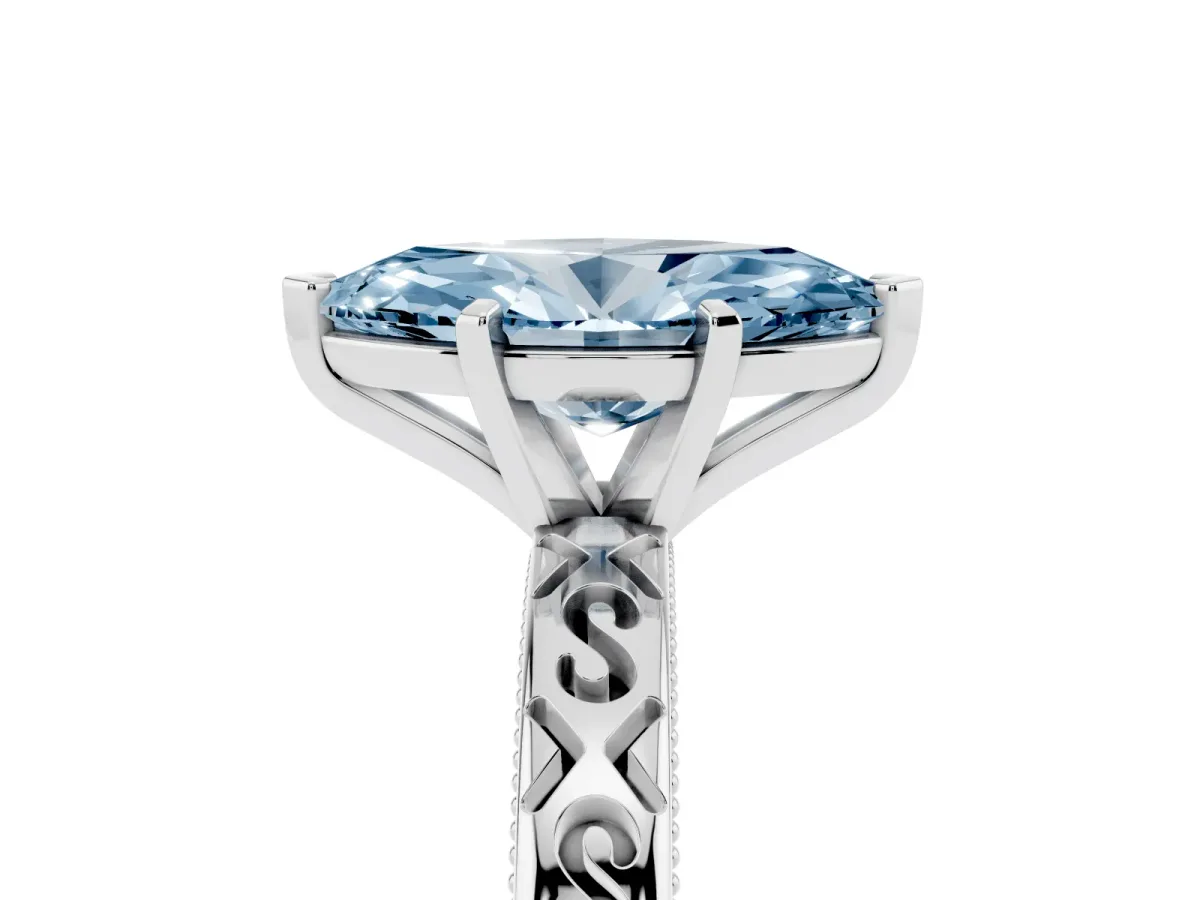 Fancy Blue Marquise Cut Solitaire Engagement Ring with Scrollwork Band and Four-Prong Setting Silver