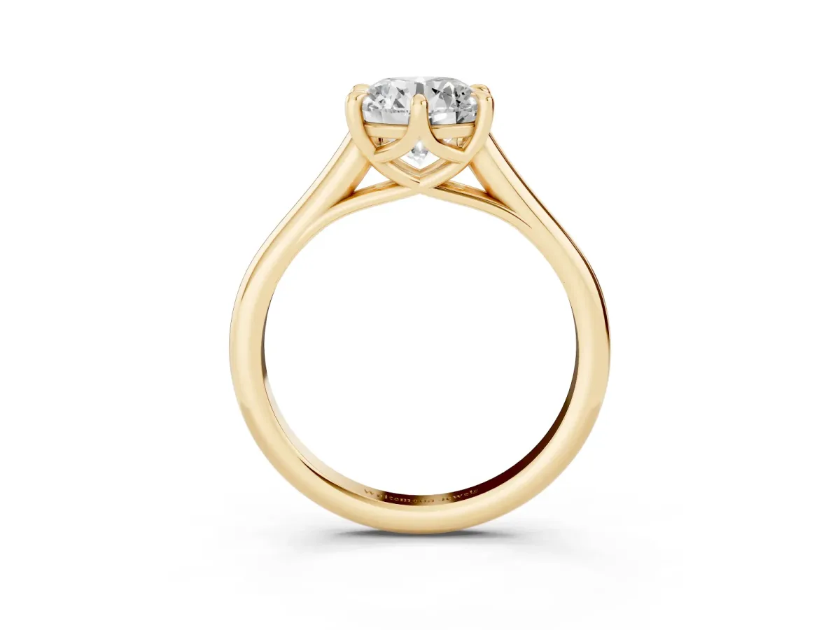 Round Cut Solitaire Engagement Ring with Six-Prong Setting and Classic Band Yellow gold