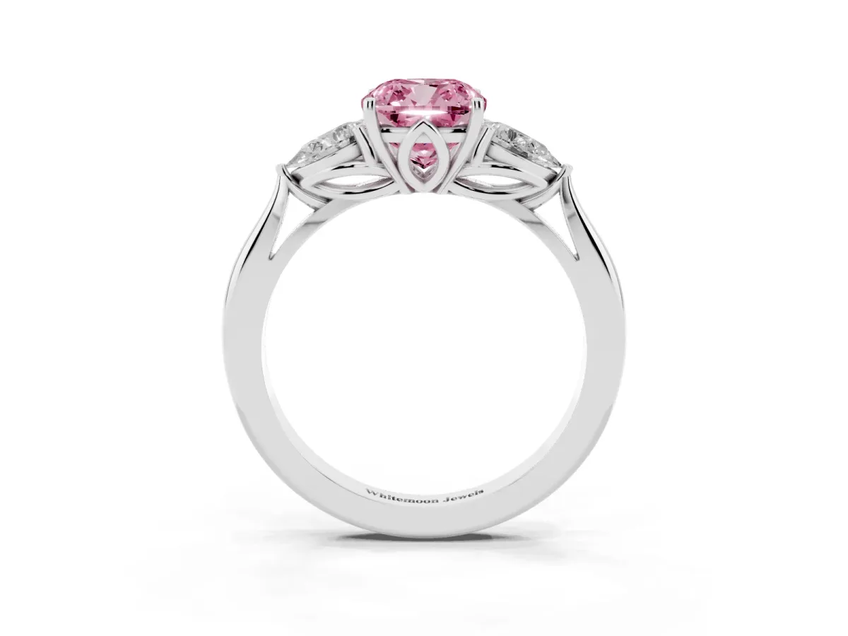 Fancy Pink Three-Stone Cushion Cut Diamond Ring with Pear Side Stones in Four-Prong Setting Platinum
