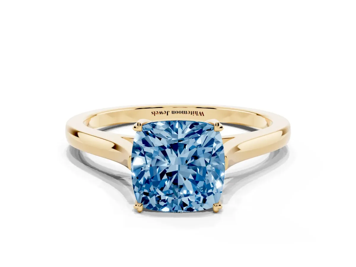 Fancy Blue Cushion Cut Solitaire Heart Prong Engagement Ring with Tapered Band Yellow gold