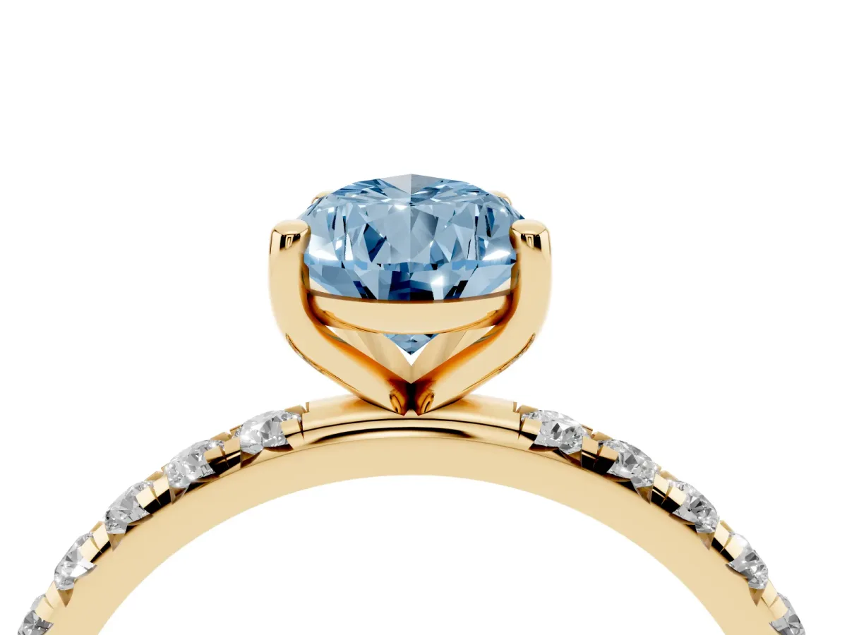 Fancy Blue Pear Cut Cut Diamond Solitaire Ring with Micro Pave Band and Four Prong Setting Yellow gold