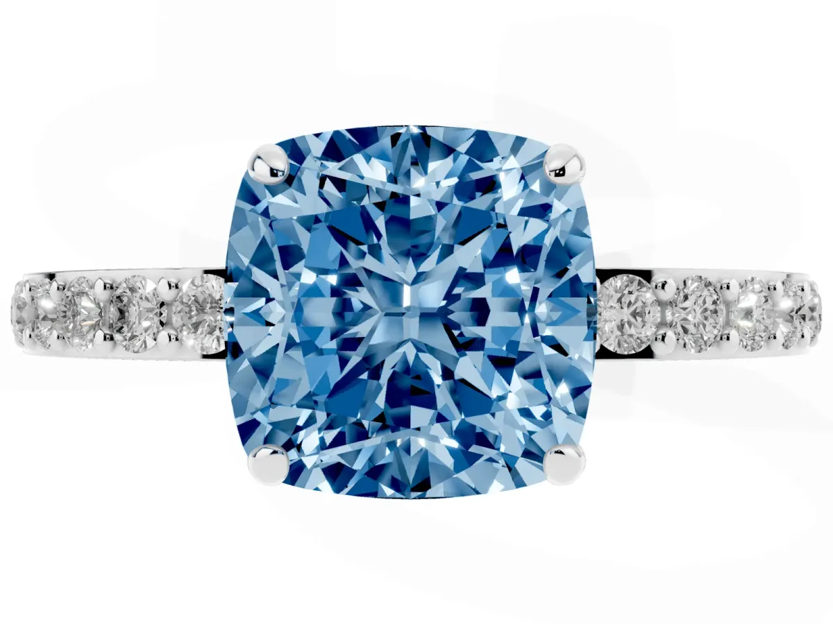 Fancy Blue Cushion Cut Diamond Solitaire Engagement Ring with Pavé Band and Four-Prong Setting Silver
