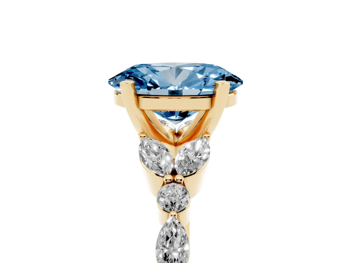 Fancy Blue Oval Cut Diamond Solitaire Ring with Side Stones and Four-Prong Setting Yellow gold