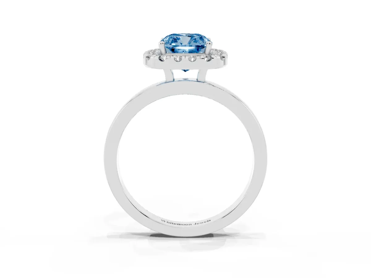 Fancy Blue Cushion Cut Halo Diamond Solitaire with Pavé Band and Four-Prong Setting Silver