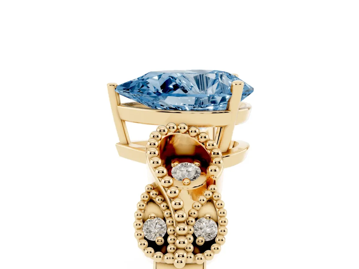 Fancy Blue Pear Cut Solitaire Milgrain Leaf Band with Prong Setting Yellow gold